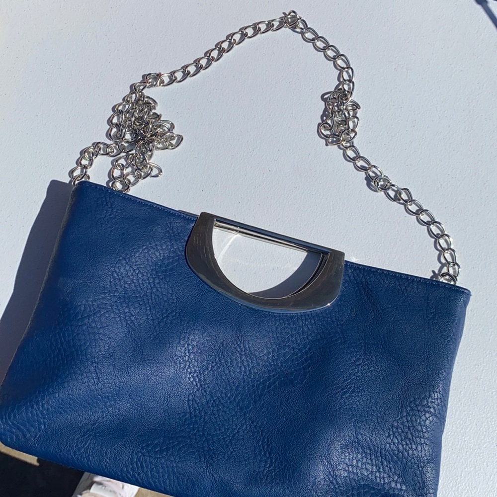 Blue leather bag, silver chain - good condition